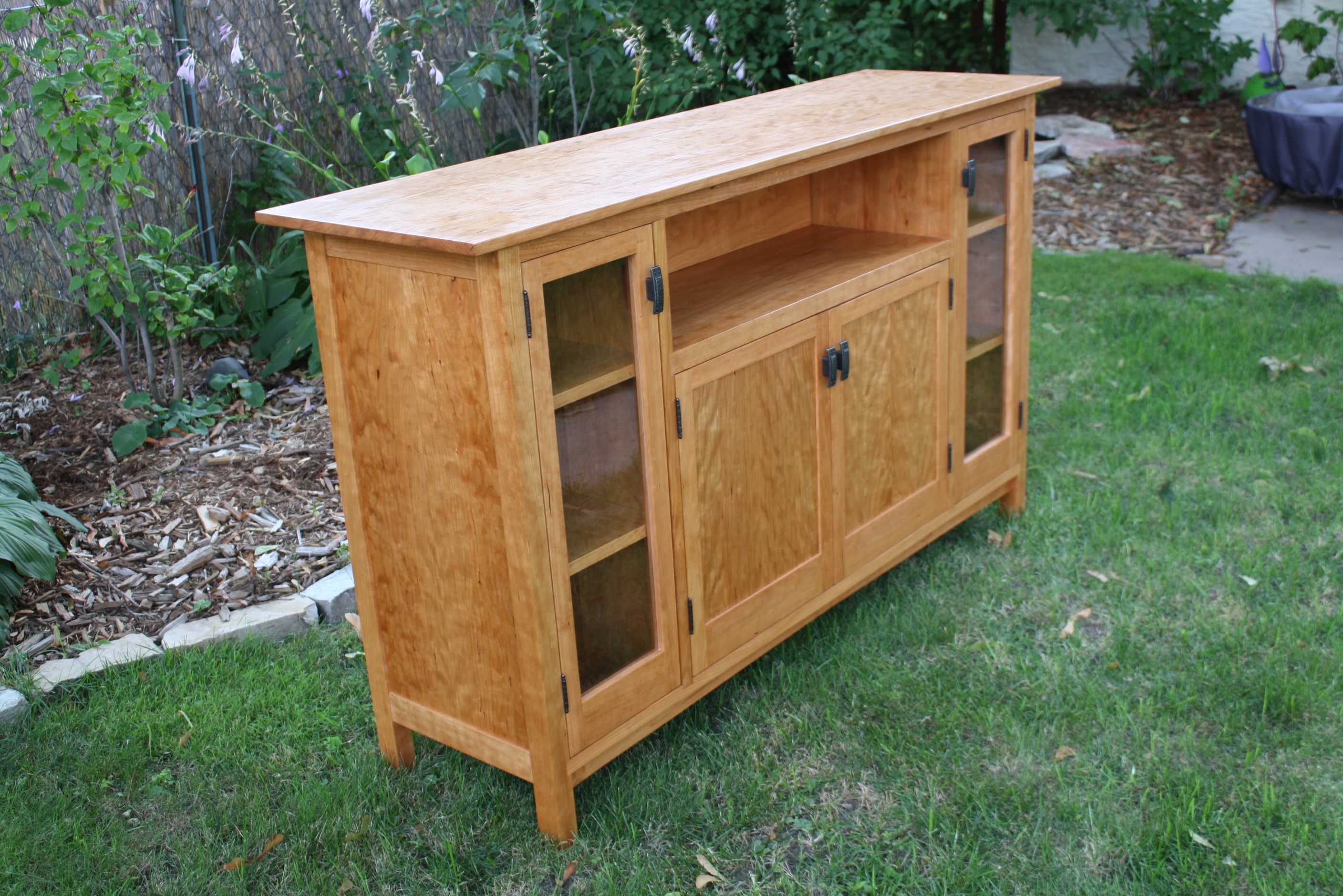 This is a curly cherry entertainment center that I built for a client 